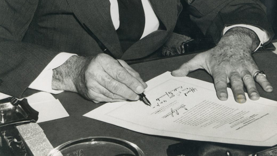 President Franklin Roosevelt signs the Declaration of War against Japan in 1941