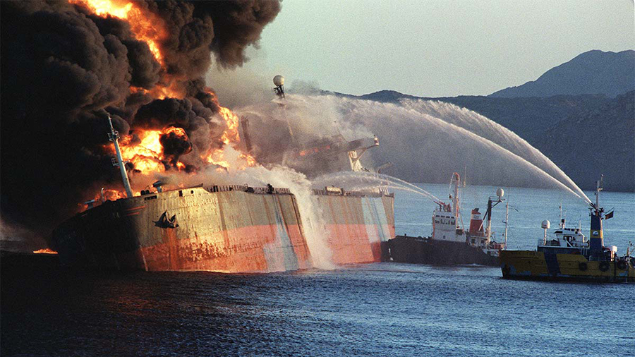 an Iraqi tanker on fire in the Strait of Hormuz in 1987