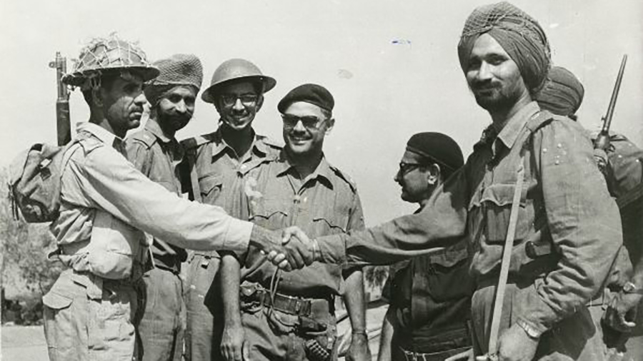 Indian and Pakistani troops shaking hands after a UN-brokered ceasefire in 1966